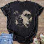 Black t-shirt with a distressed graphic of a Chihuahua’s face smoking a cigarette.