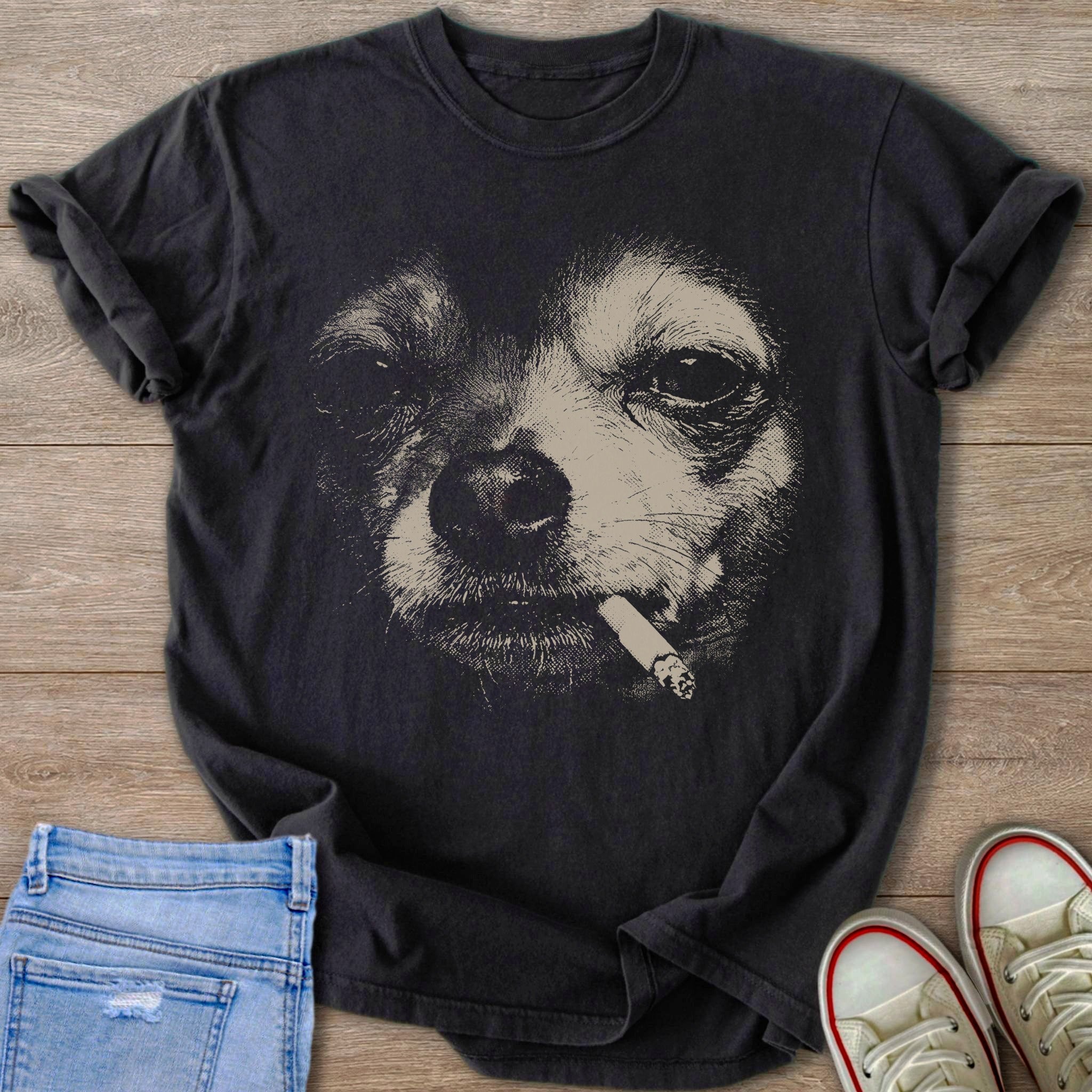 Black t-shirt with a distressed graphic of a Chihuahua’s face smoking a cigarette.