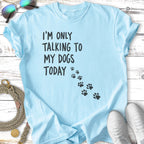 Light blue t-shirt with "I'm only talking to my dogs today" and paw prints.