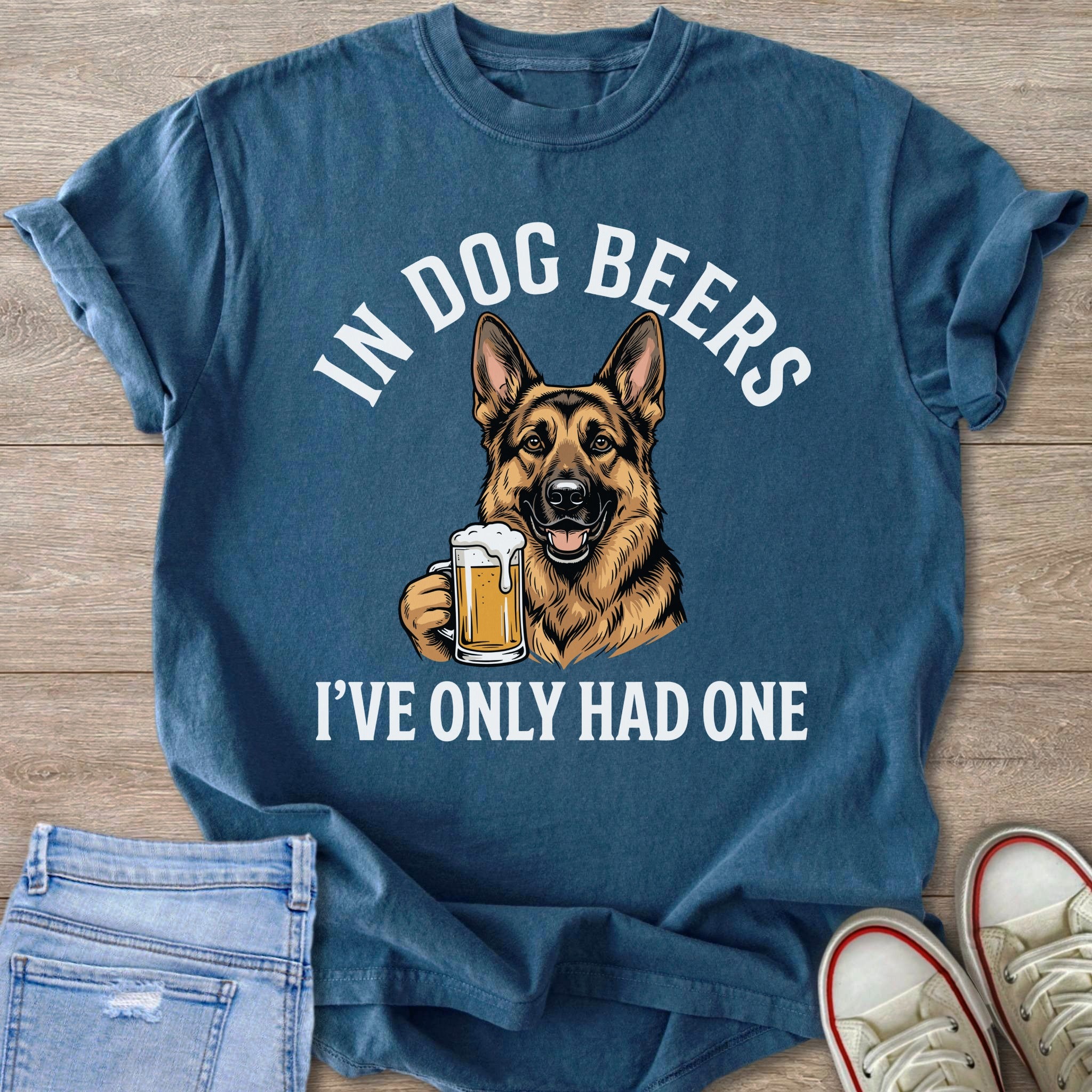 German Shepherd holding a beer mug with text "In Dog Beers I've Only Had One".
