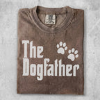 Brown t-shirt with "The Dogfather" text and paw prints.