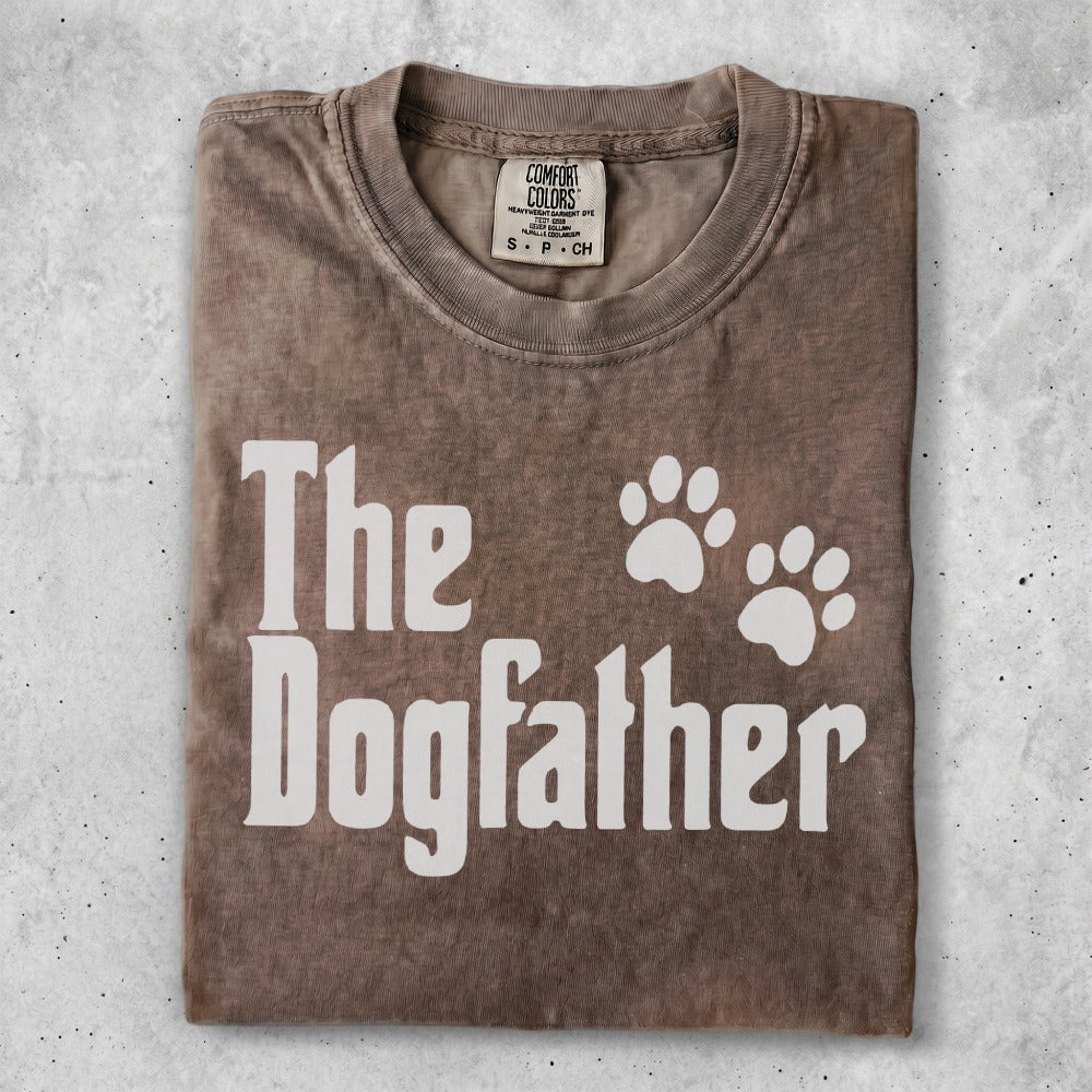 Brown t-shirt with "The Dogfather" text and paw prints.