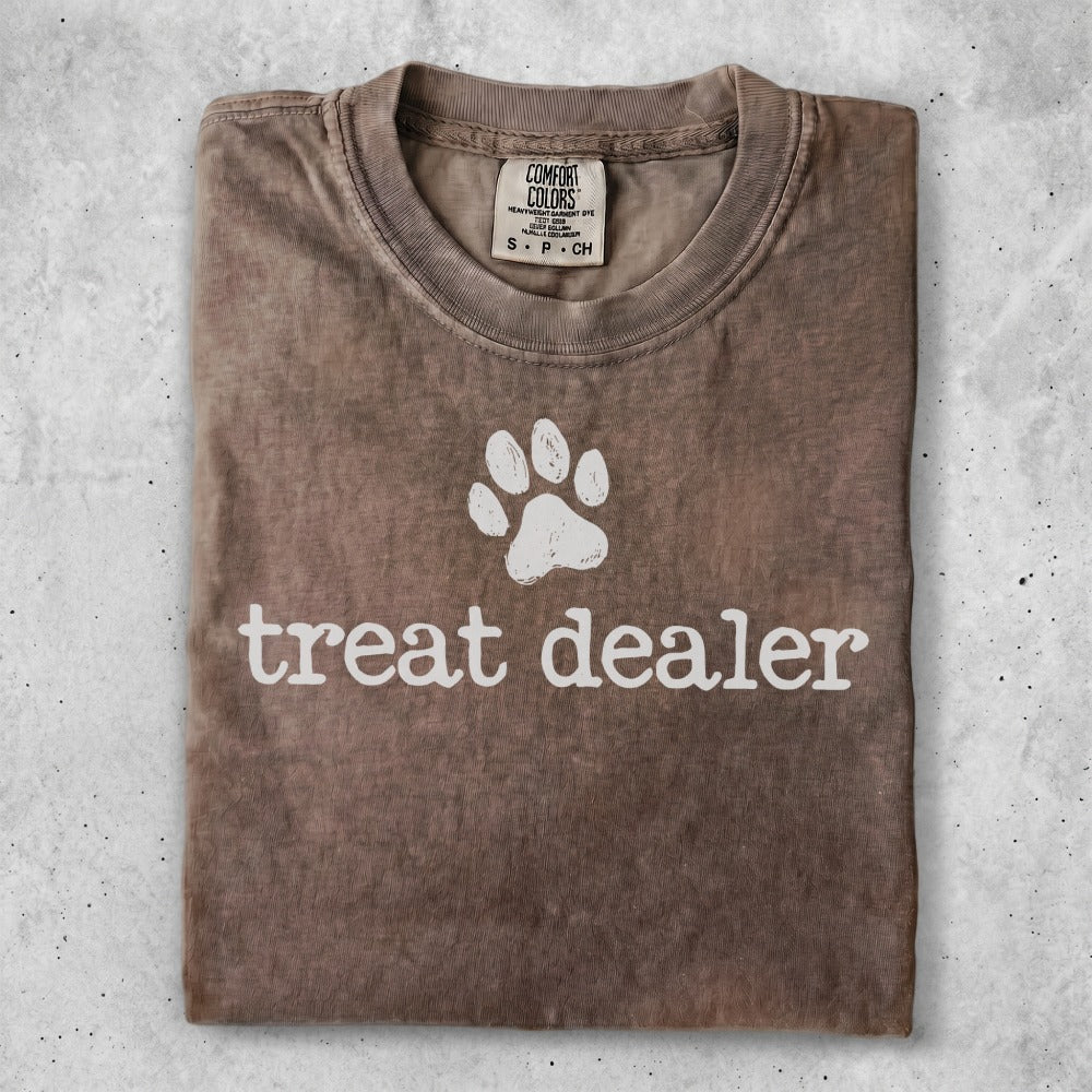 Comfort Colors brown t-shirt with "treat dealer" and paw print graphic.