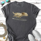T-shirt featuring a playful light brown puppy mid-jump over a puddle.