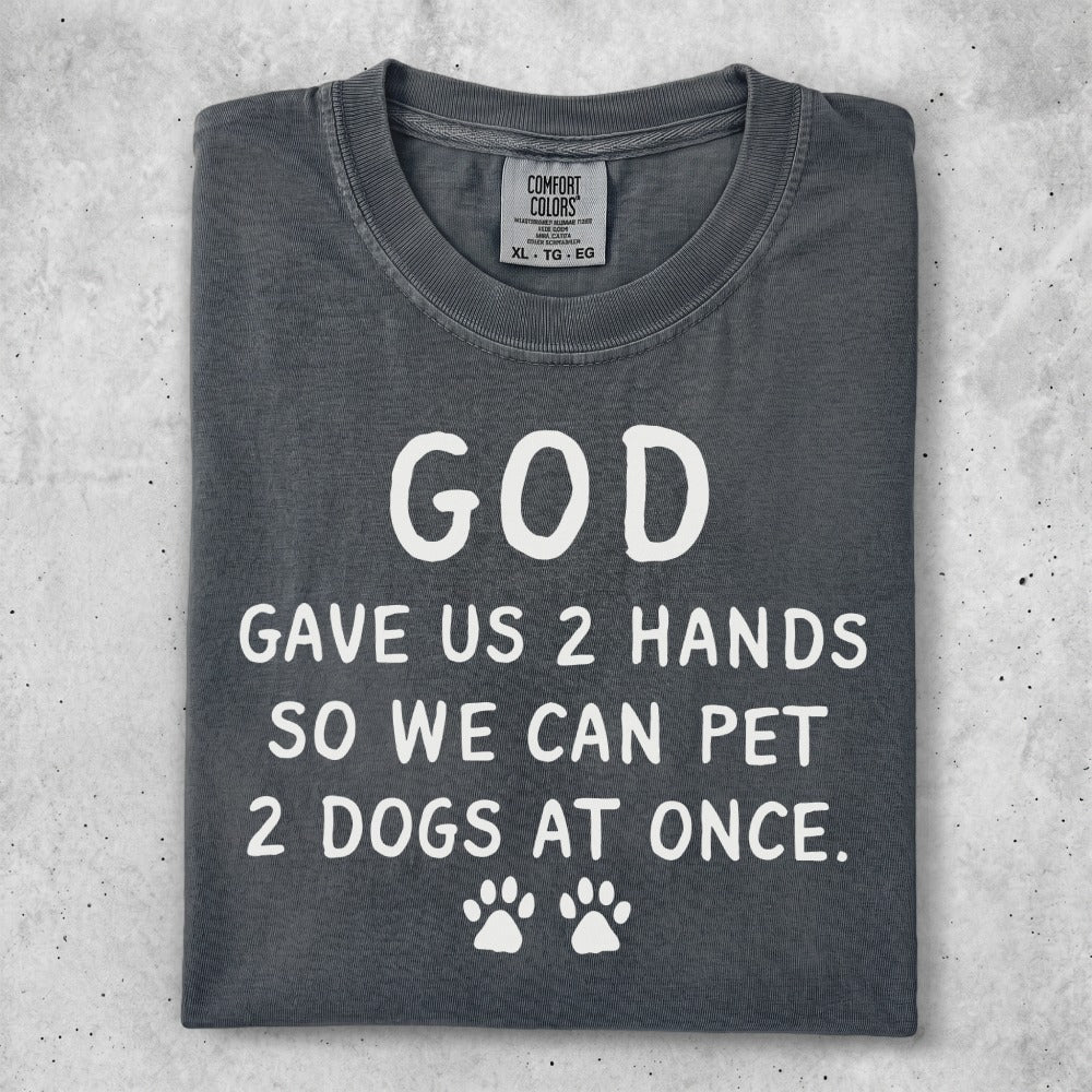 Charcoal t-shirt with text "God gave us 2 hands so we can pet 2 dogs at once."