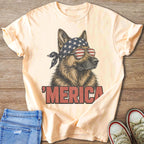 German Shepherd wearing American flag bandana and sunglasses, with "MERICA" text.