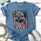 Pug wearing sunglasses and bandana with American flag print.