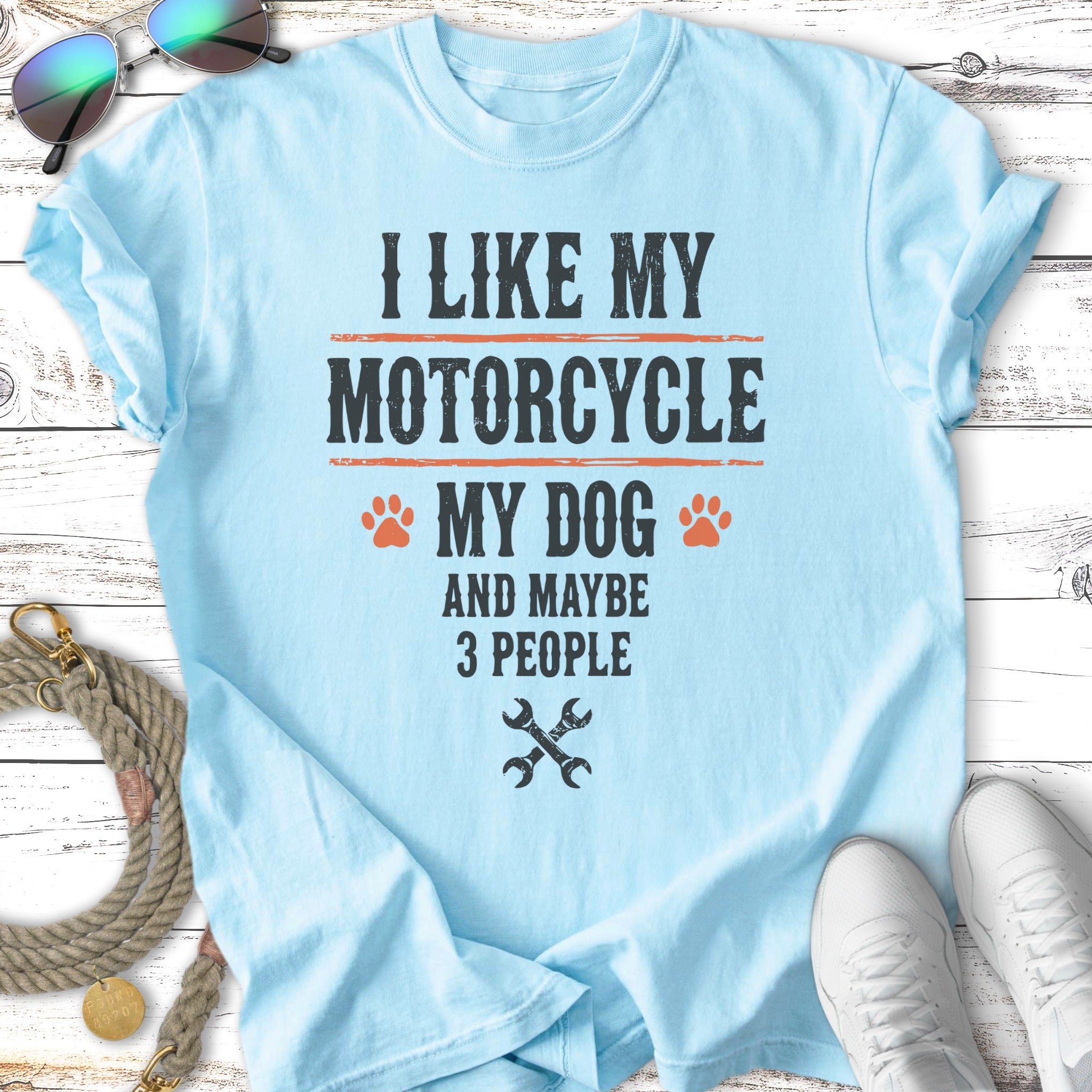 Light blue t-shirt with "I LIKE MY MOTORCYCLE, MY DOG, AND MAYBE 3 PEOPLE" text.