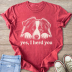 Red t-shirt with a white line drawing of a Border Collie and the text "yes, I herd you".