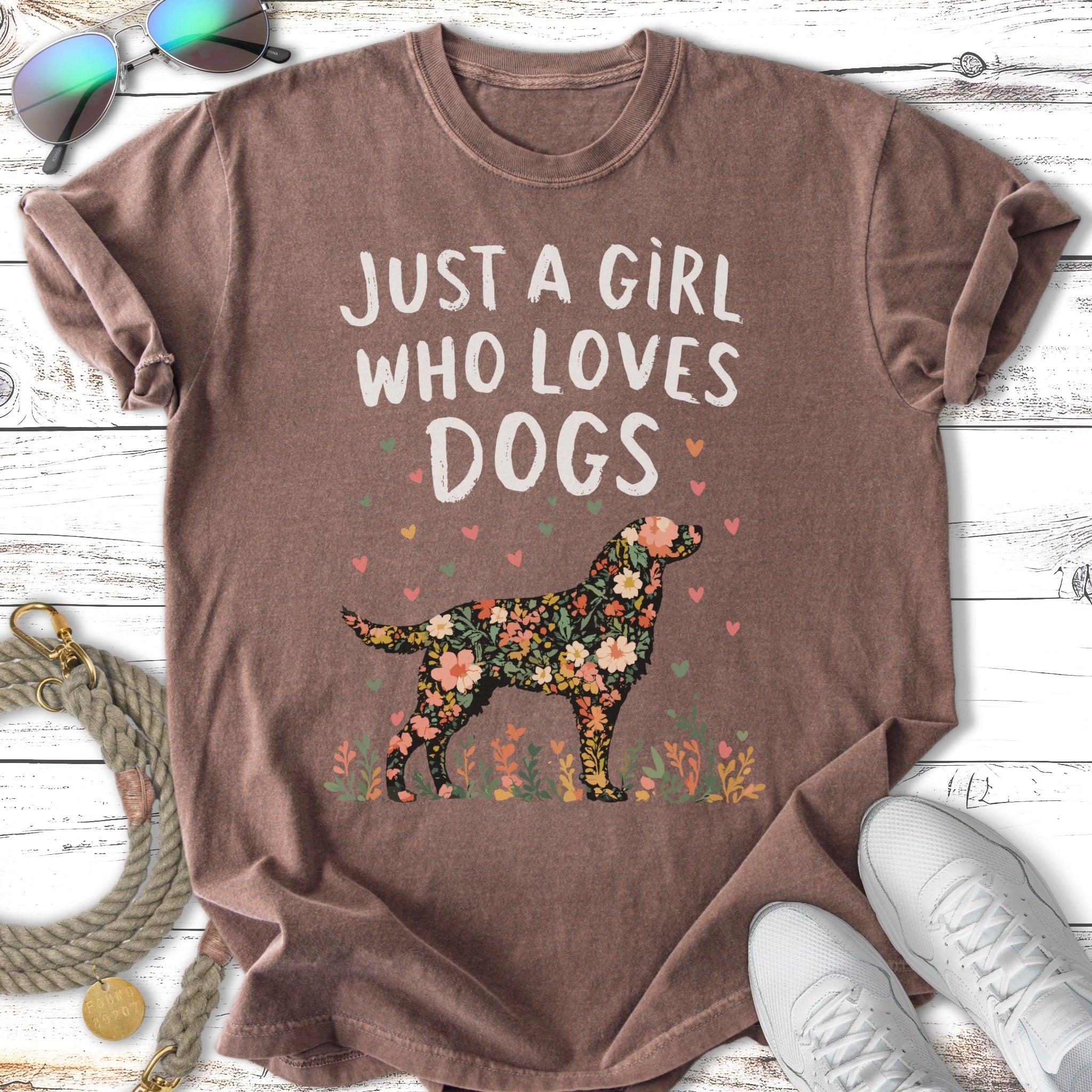 Floral silhouette of a dog with text "Just a girl who loves dogs."