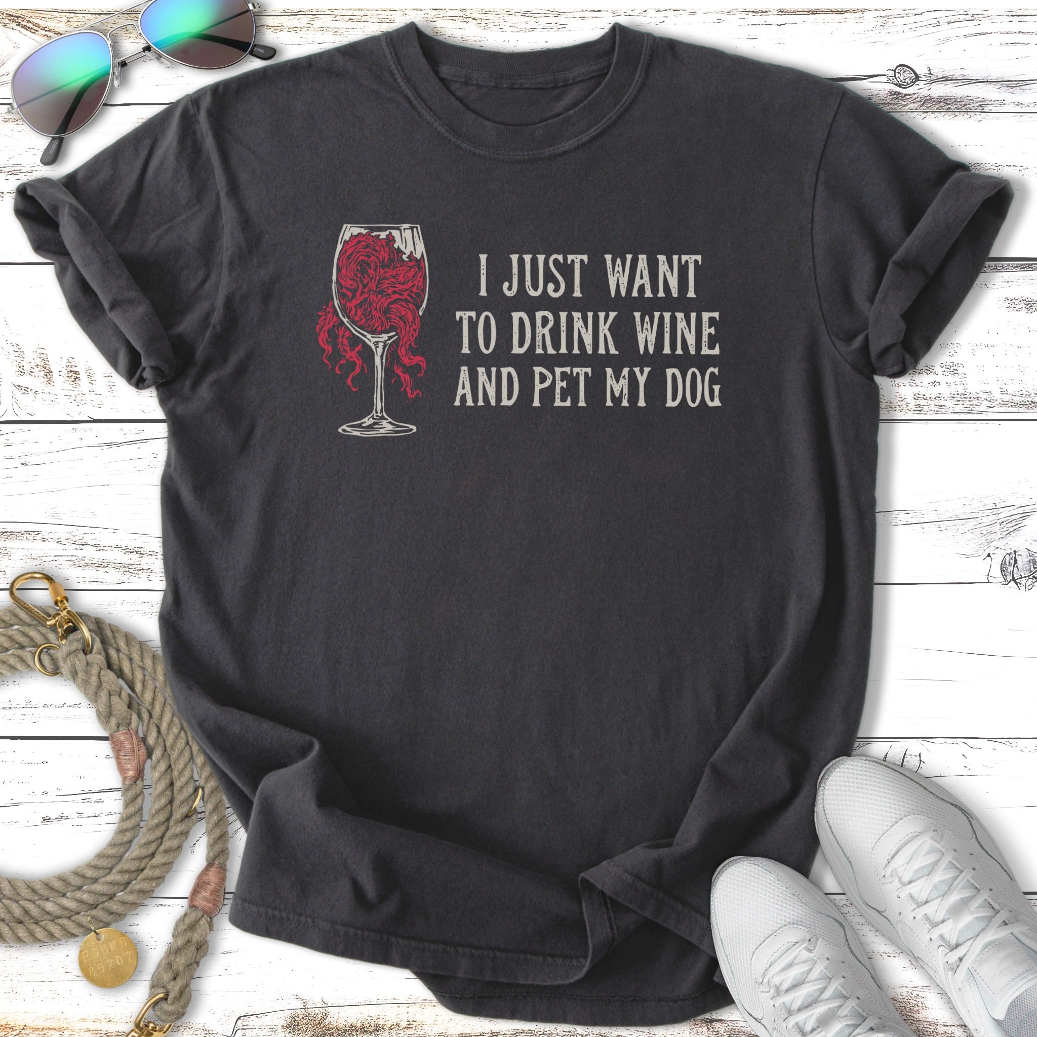 Dark t-shirt with wine glass graphic and text: "I just want to drink wine and pet my dog."