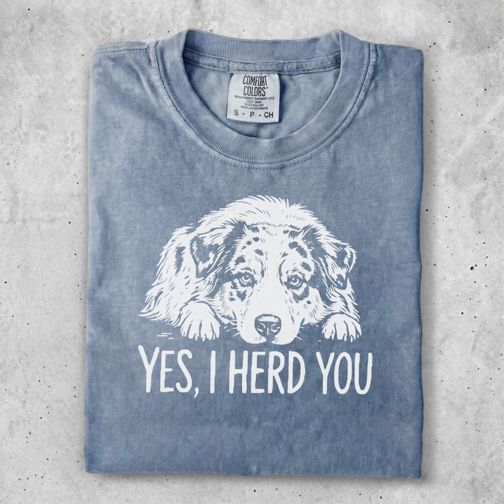 Blue t-shirt with white dog graphic and text "YES, I HERD YOU."