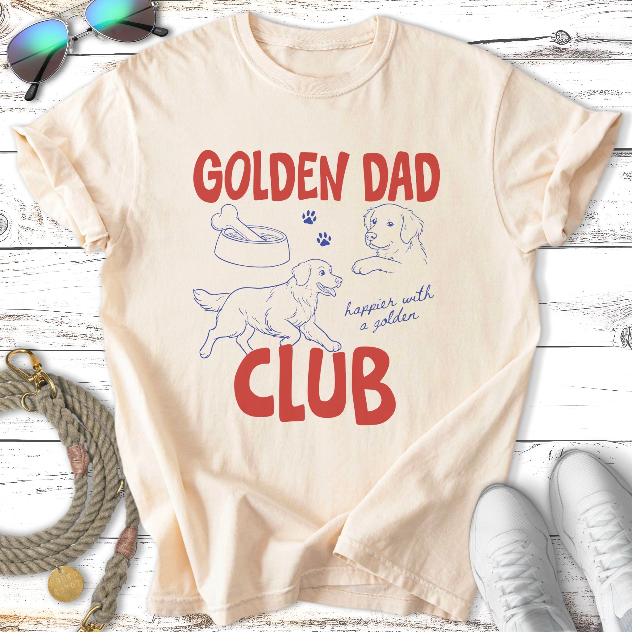 Golden Dad Club graphic with dogs and a bone, cream t-shirt.