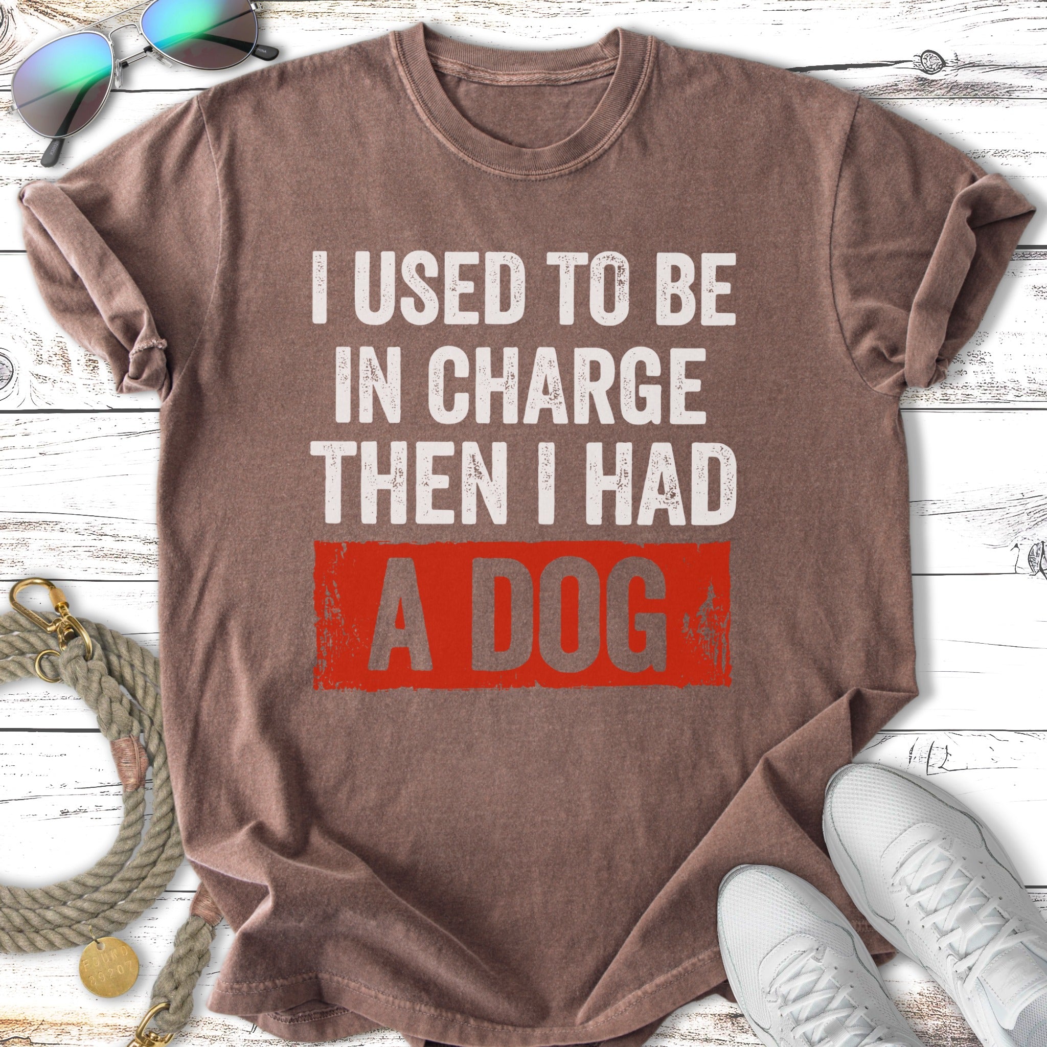 Brown t-shirt with text "I used to be in charge, then I had a dog."