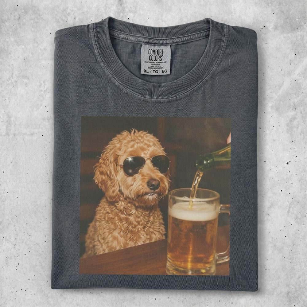 Dog wearing sunglasses being served a beer from a bottle.