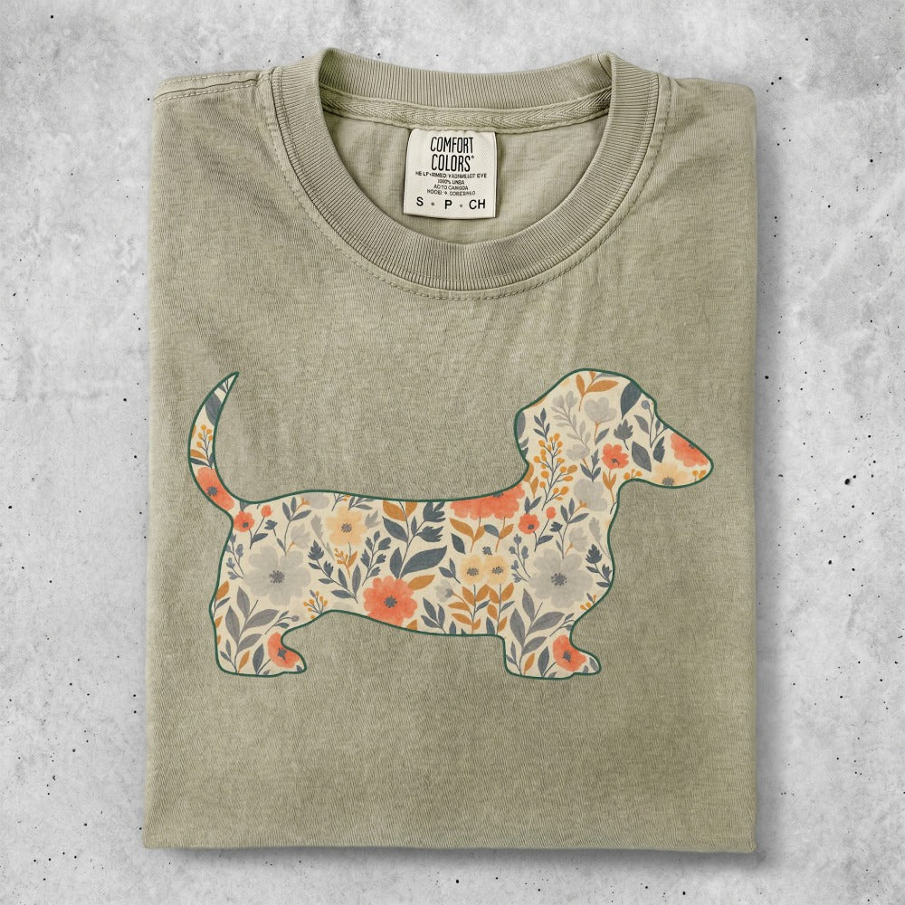T-shirt with a silhouette of a dachshund filled with a floral pattern.