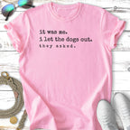 Pink t-shirt with "it was me. i let the dogs out. they asked." text.