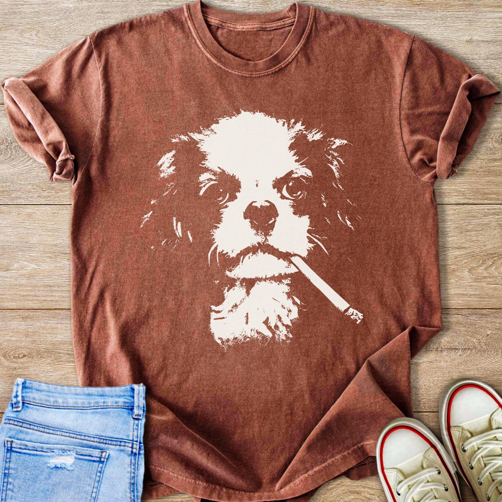 T-shirt with a white graphic of a dog’s face smoking a cigarette.