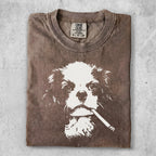 T-shirt with distressed print of a dog smoking a cigarette.