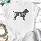 White t-shirt with "PIT MOM" text inside a silhouette of a dog.