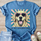 Golden retriever wearing pink sunglasses with text "IN MY GOLDEN ERA".