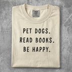 Comfort Colors t-shirt with "PET DOGS. READ BOOKS. BE HAPPY." text.