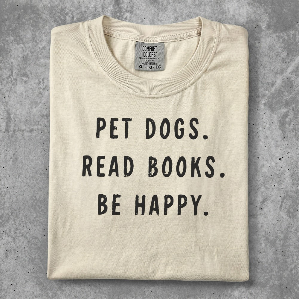 Comfort Colors t-shirt with "PET DOGS. READ BOOKS. BE HAPPY." text.