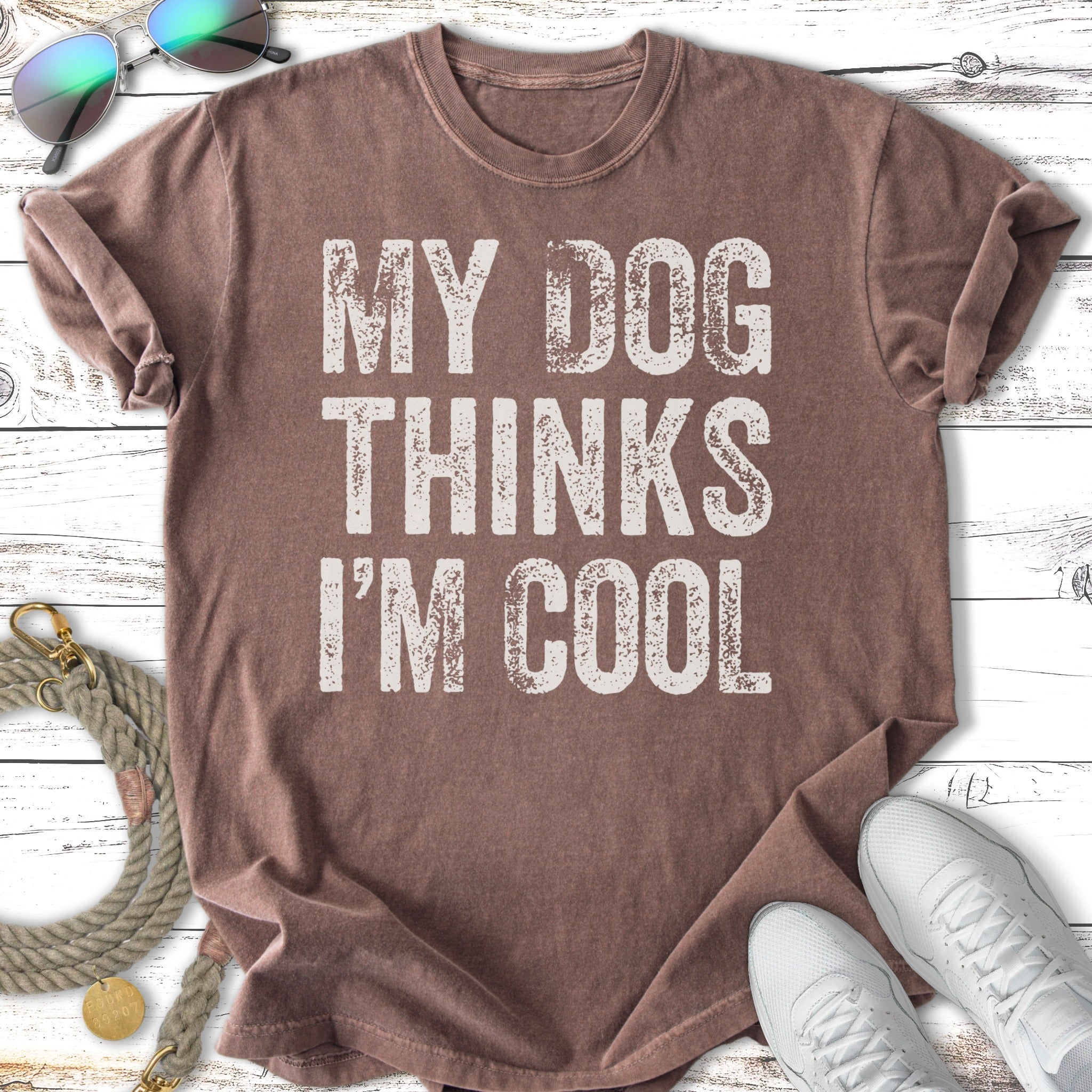 Brown t-shirt with "MY DOG THINKS I'M COOL" in white text.