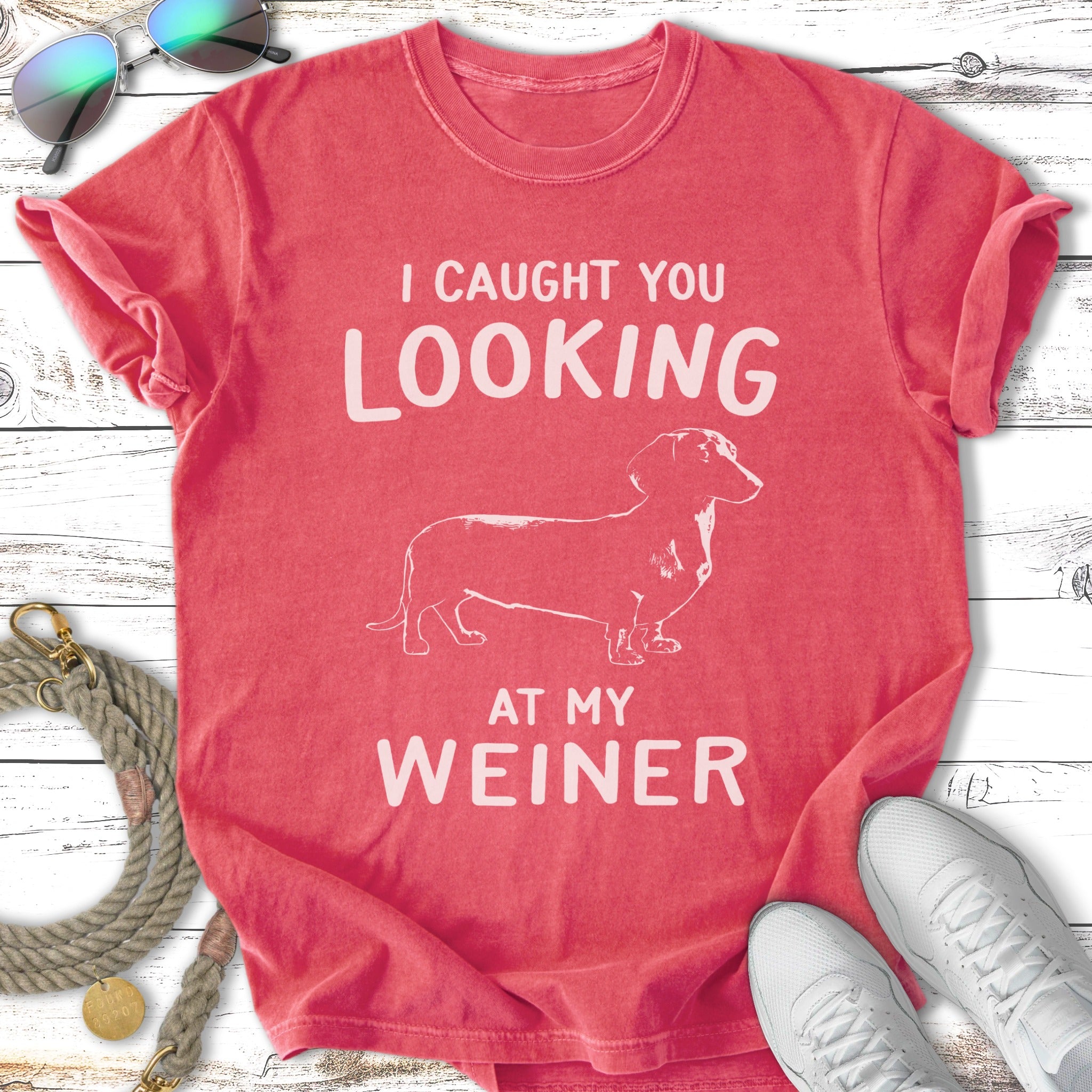 T-shirt with a dachshund graphic and text "I caught you looking at my Weiner".