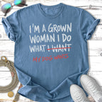 Blue t-shirt with "I'M A GROWN WOMAN I DO WHAT I WANT MY DOG WANTS" text.