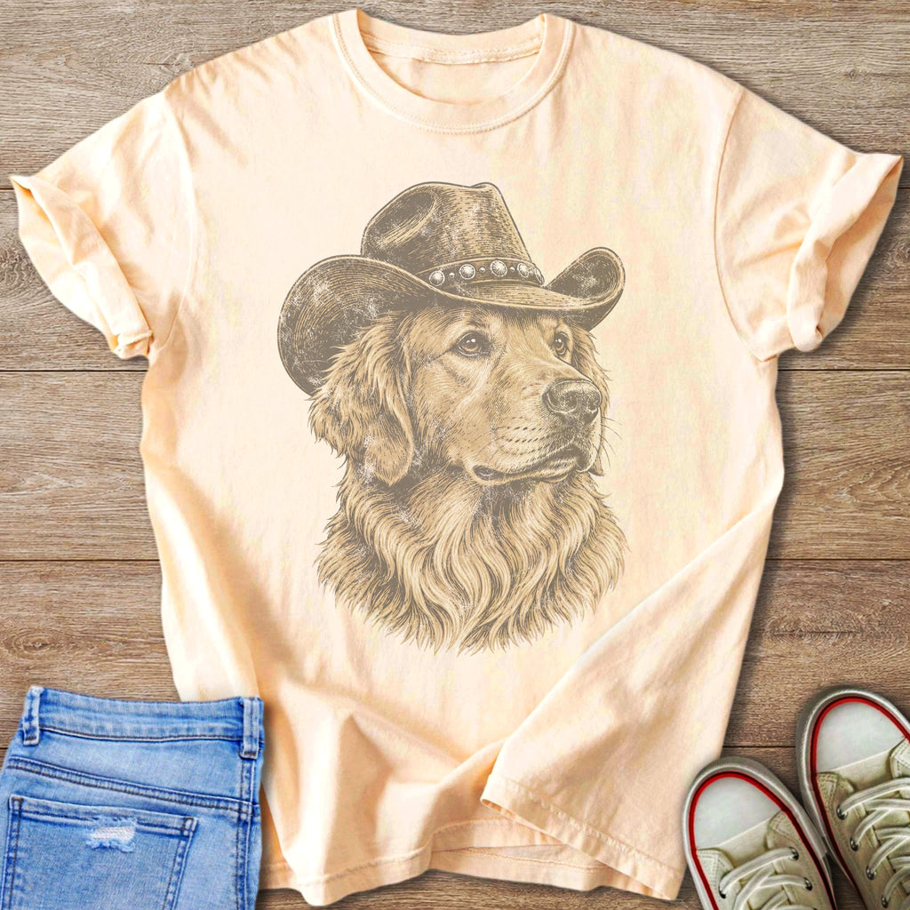 Peach t-shirt with sketched golden retriever wearing a cowboy hat.