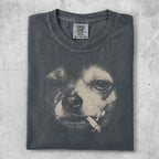Dark t-shirt featuring a charcoal sketch of a dog's face with a cigarette.