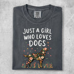 Dark t-shirt with "Just a girl who loves dogs" and floral dog design.