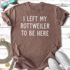 Brown t-shirt with white text: "I LEFT MY ROTTWEILER TO BE HERE."