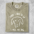 Beige t-shirt with a white dog drawing and "Sorry I have to go, I miss my dog" text.