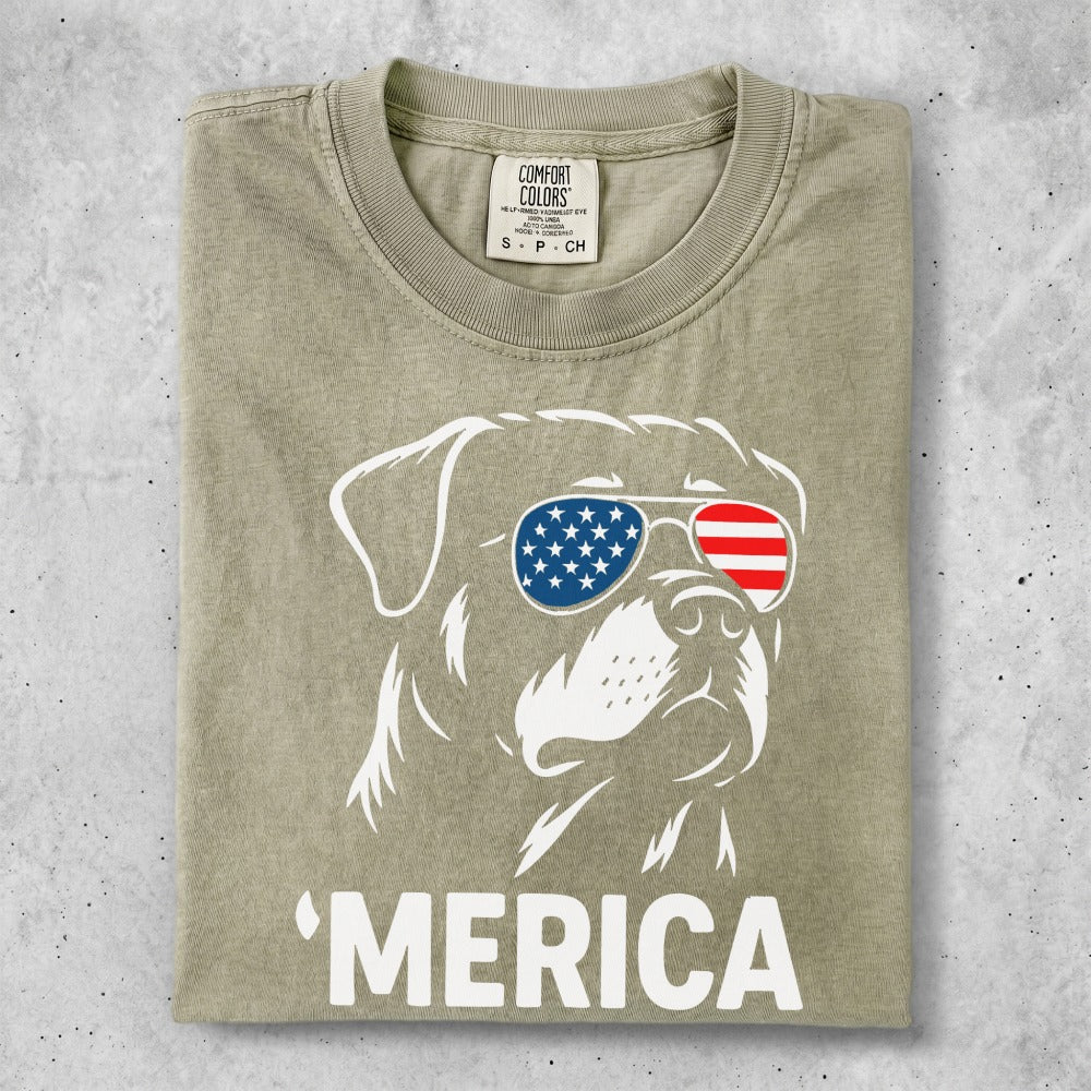 Rottweiler wearing American flag sunglasses with 'Merica text.