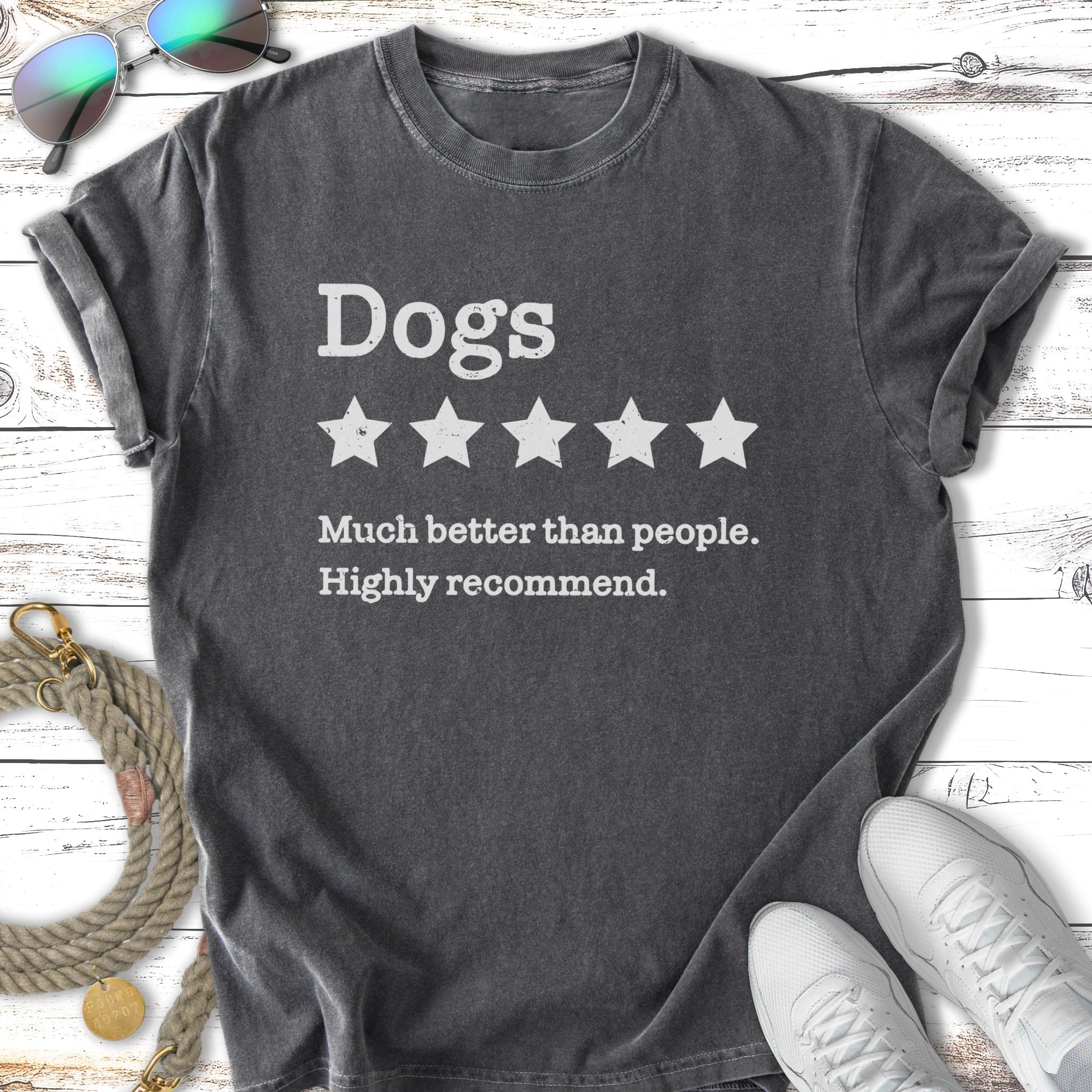 Dark grey t-shirt with "Dogs Much better than people. Highly recommend." text.