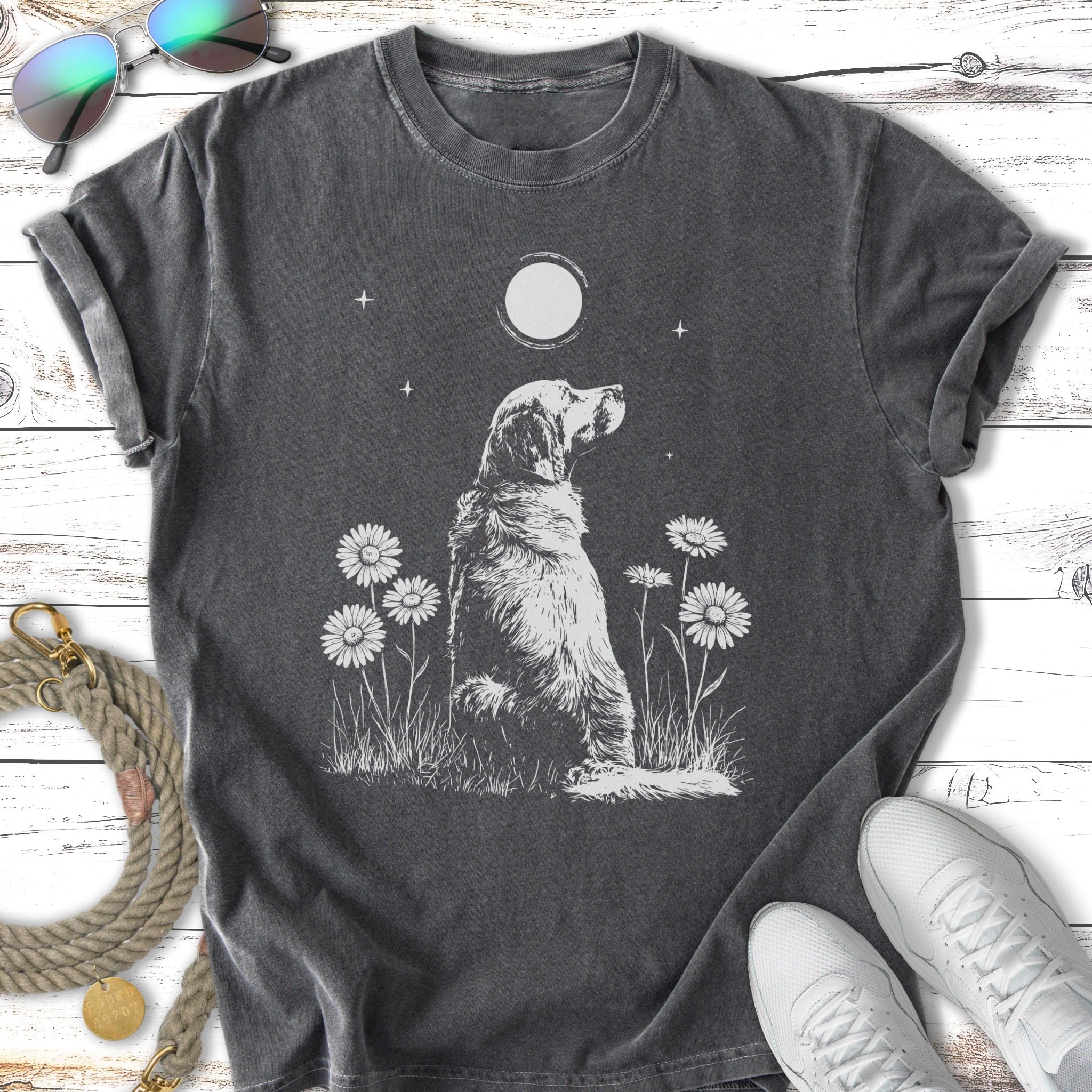 Golden retriever in grass with moon and daisies.