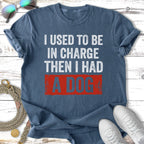 Navy t-shirt with "I used to be in charge, then I had a dog" text.