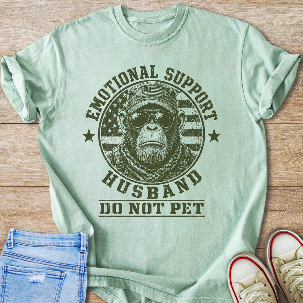 Chimp wearing sunglasses and military cap with American flag, "Emotional Support Husband Do Not Pet"