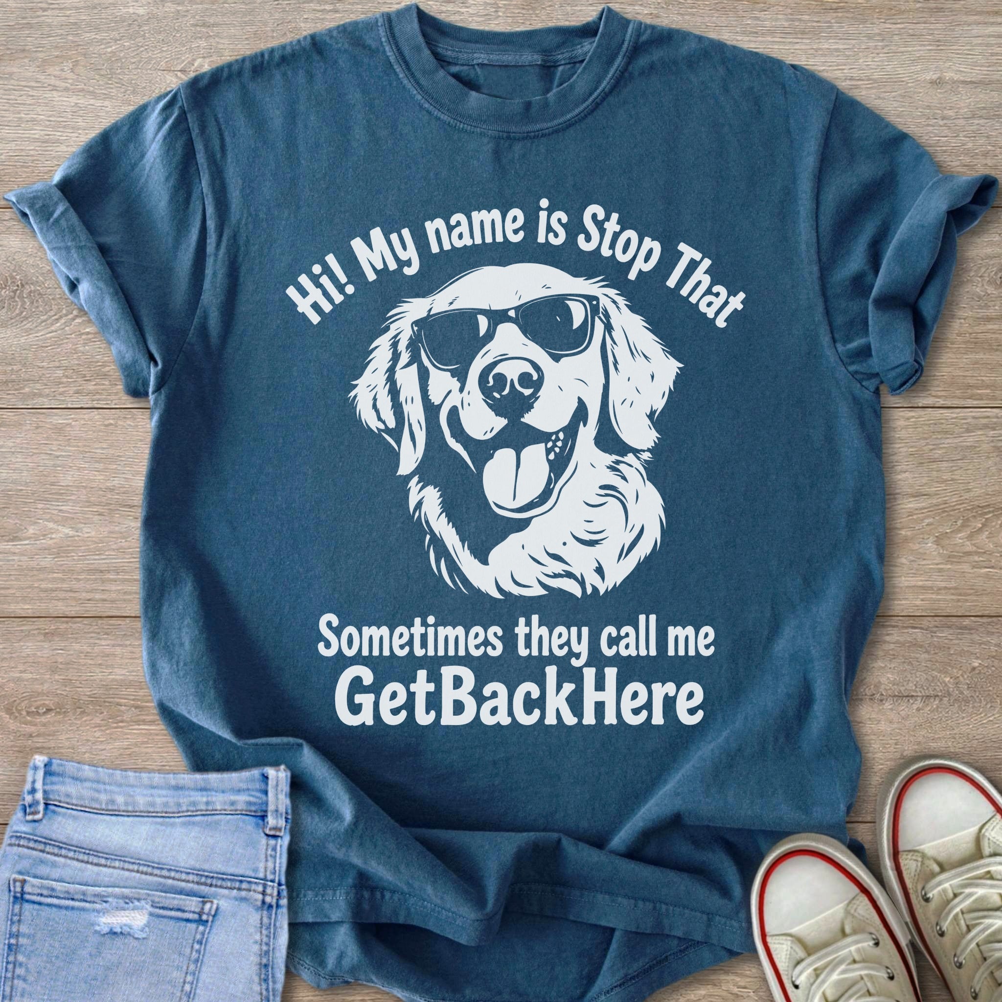 Blue t-shirt with white graphic of dog wearing sunglasses and text "Hi! My name is Stop That. Sometimes they call me GetBackHere."