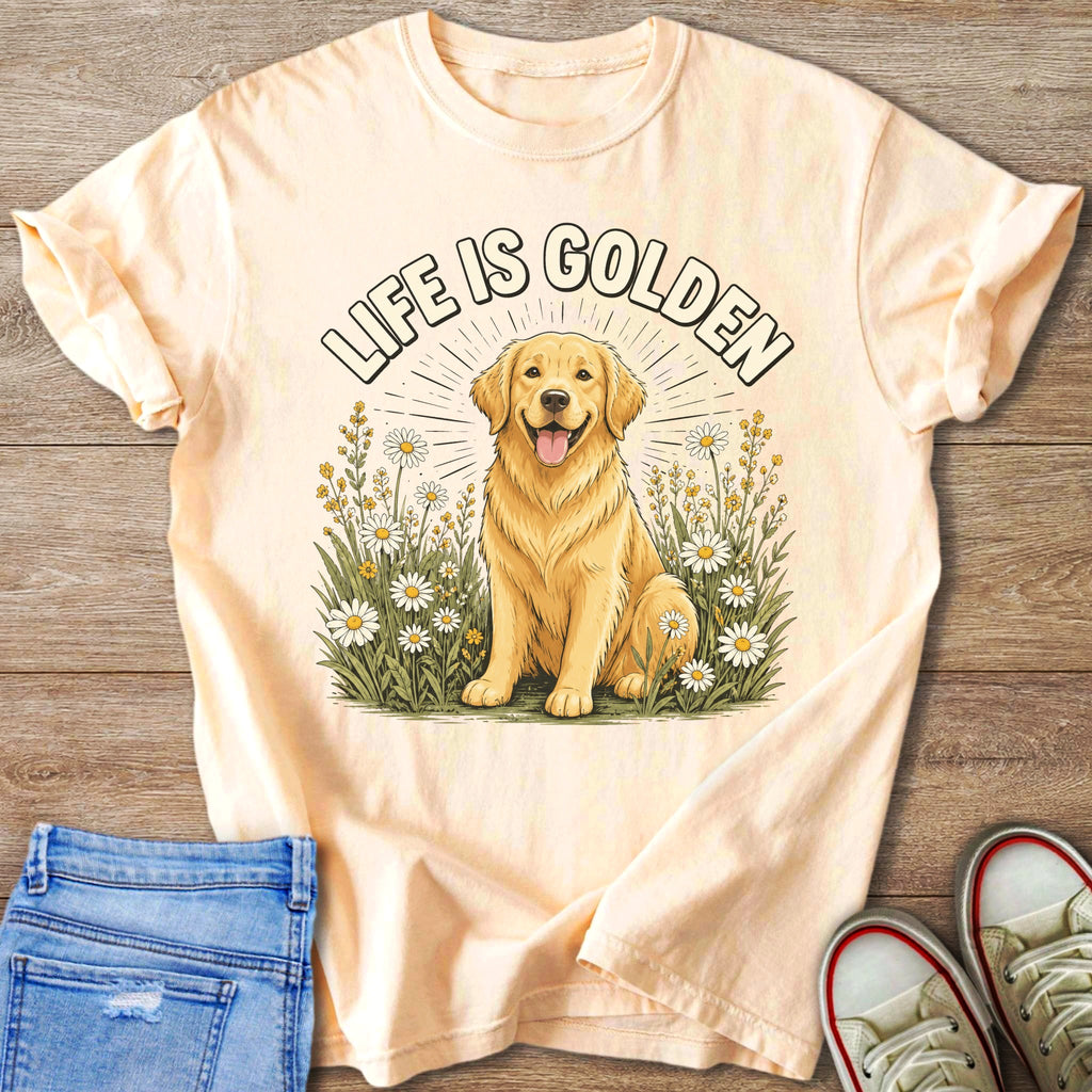 Pale yellow tee with graphic of a golden retriever in daisies, text "LIFE IS GOLDEN".