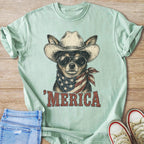 Chihuahua wearing cowboy hat and American flag bandana, with "MERICA" text.