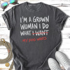 Dark grey t-shirt with "I'm a grown woman I do what I want, my dog wants" text.