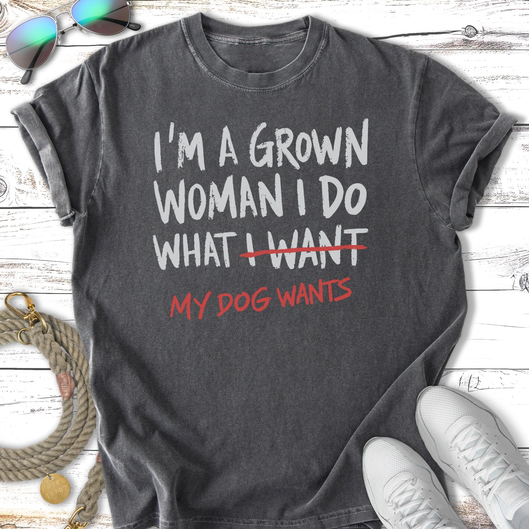 Dark grey t-shirt with "I'm a grown woman I do what I want, my dog wants" text.