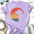 Lavender t-shirt with a dog silhouette in a retro sunset circle.