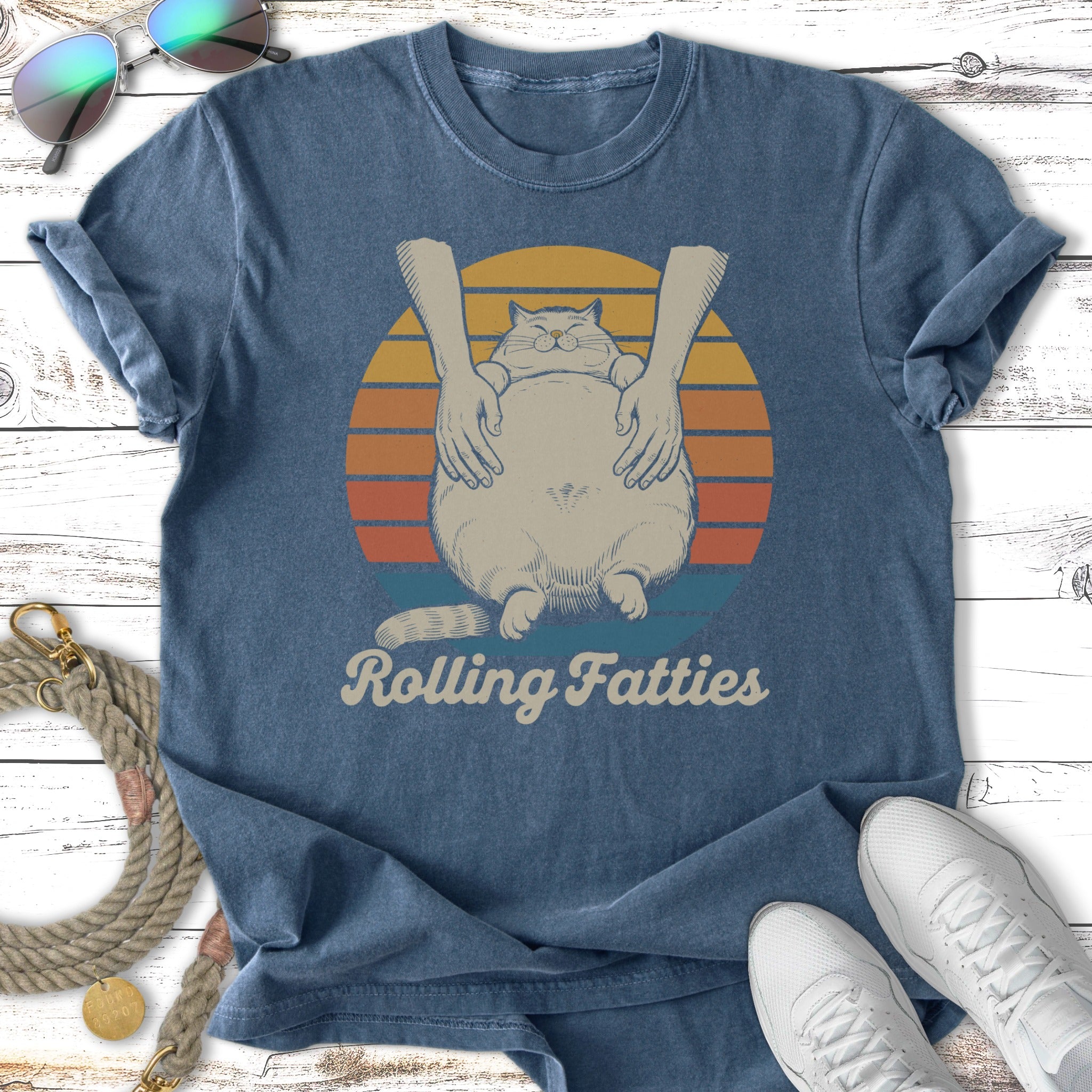 T-shirt with cat holding hands and "Rolling Fatties" text.