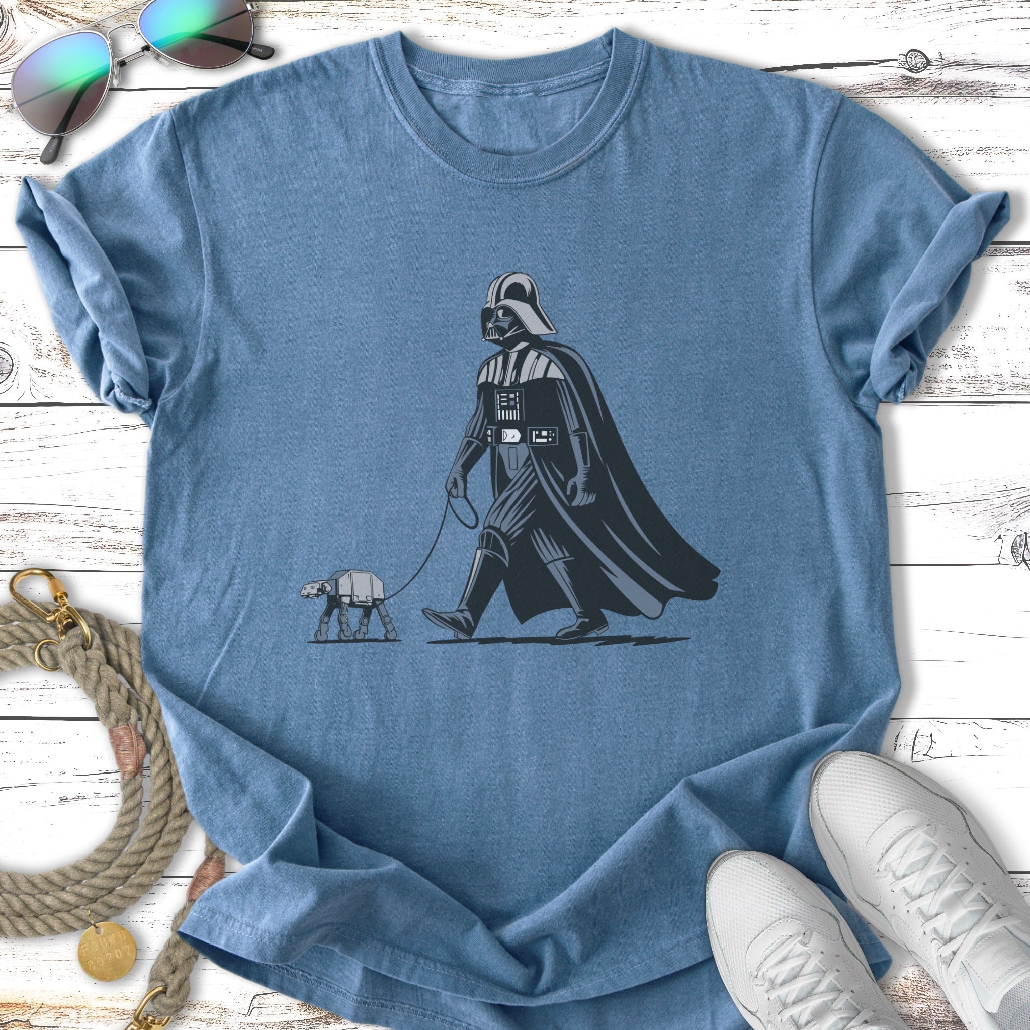 Darth Vader walking an AT-ST on a leash.