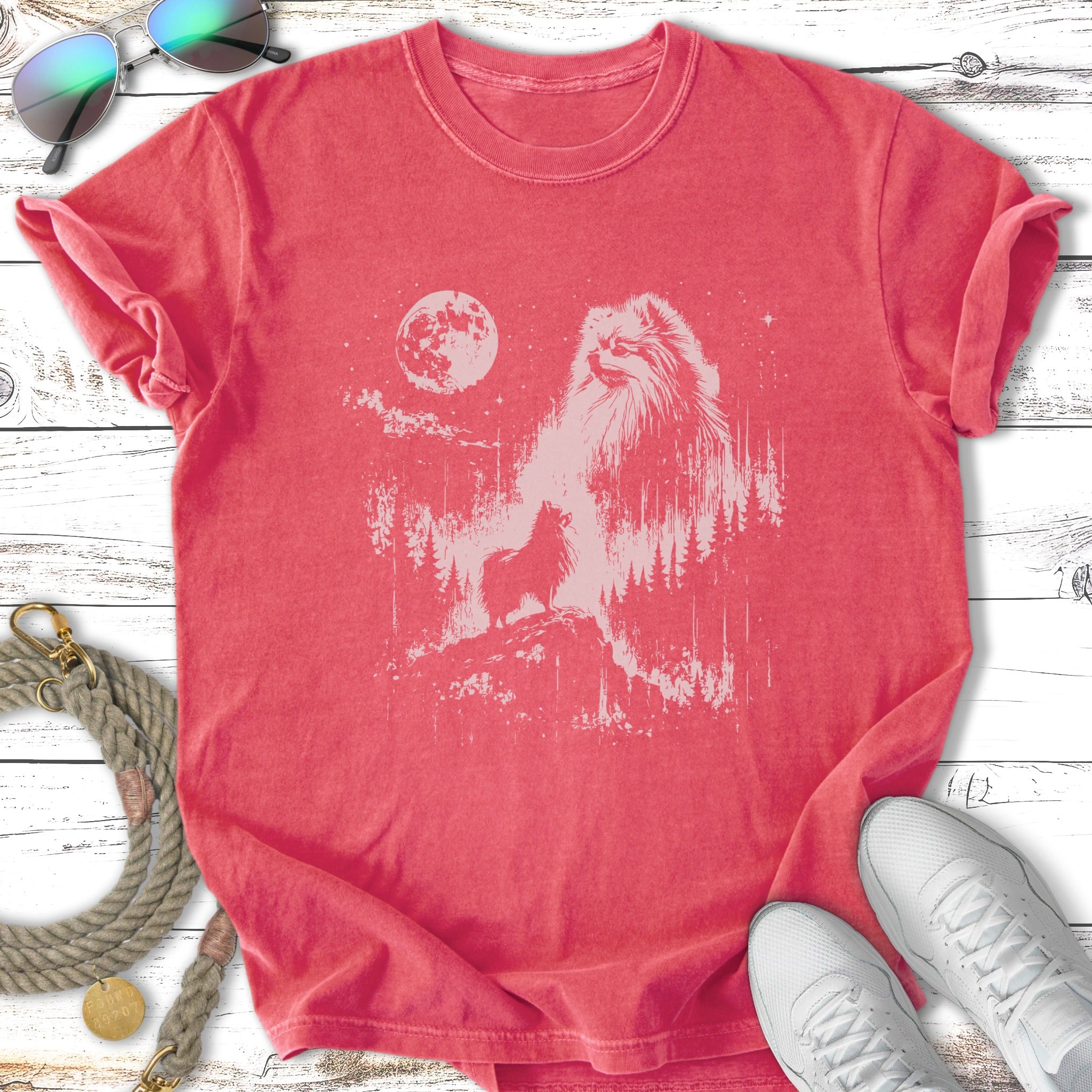 Red t-shirt with a white graphic of a Pomeranian on a mountain at moonrise.