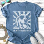 Golden Retriever wearing sunglasses on a distressed vintage tee.